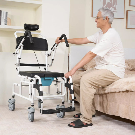 Shower commode wheelchair with padded black seat and headrest, white frame, caster wheels