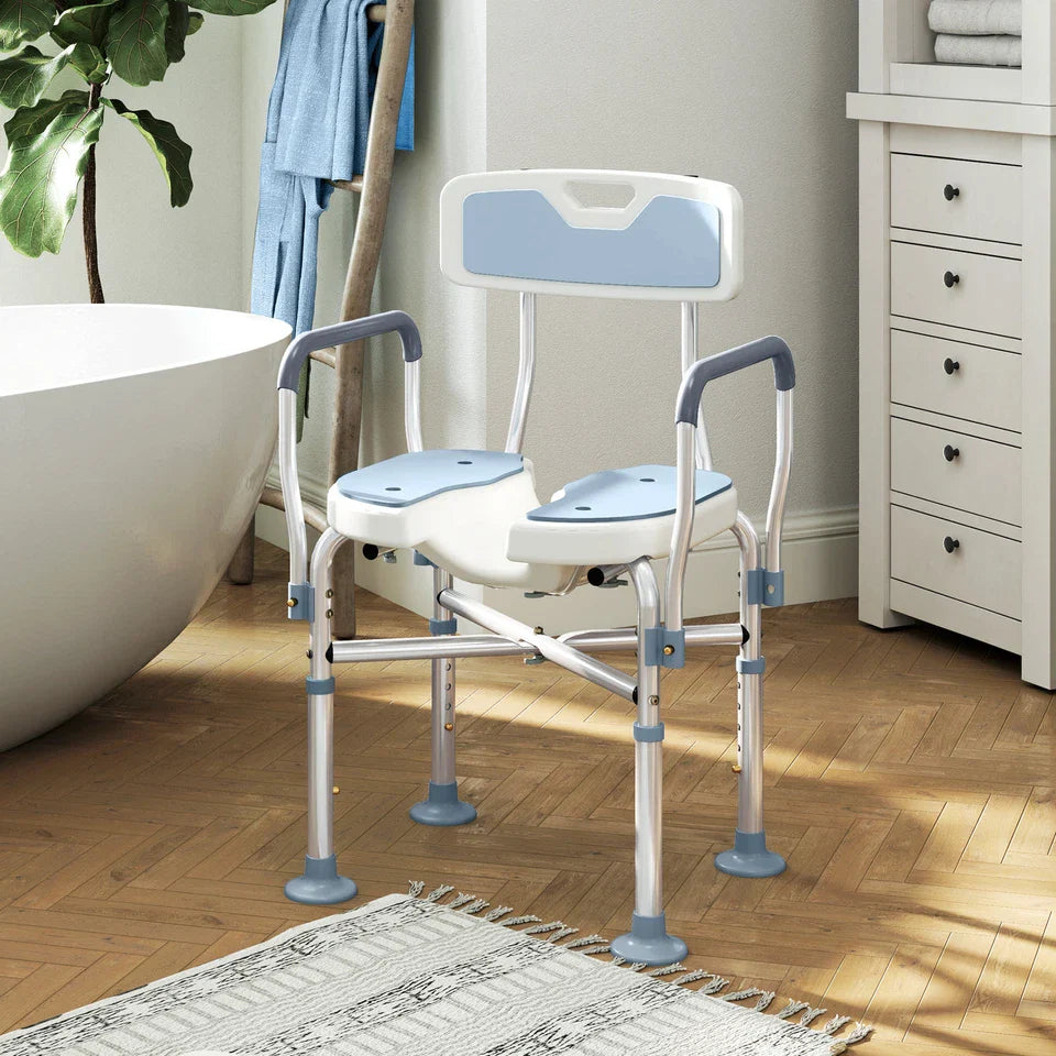 Elderly shower chair with light blue seat pads, white frame, and curved armrests
