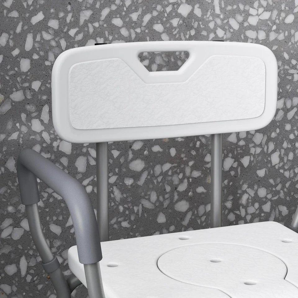 Close-up of shower commode chair back panel and white seat with support arms