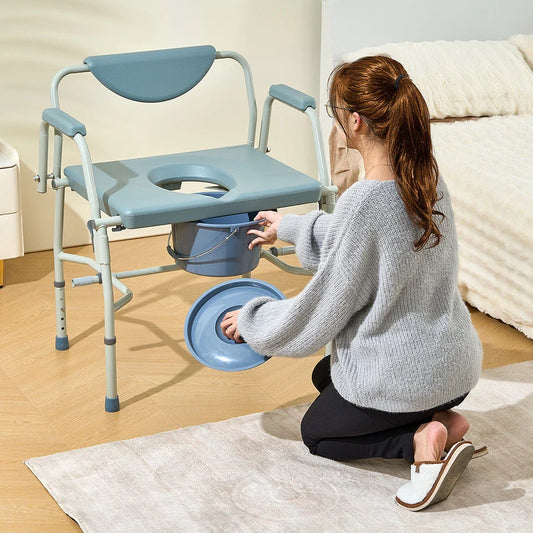 Blue toilet commode chair with padded seat, hinged lid, and open waste opening