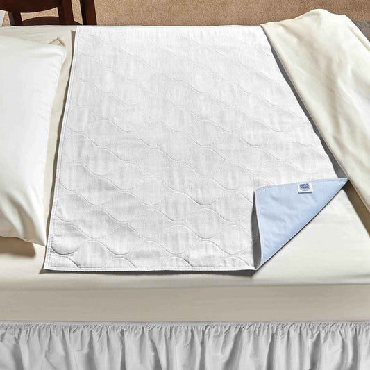 White quilted underpad with blue drawsheet flap corner, economy care underpad