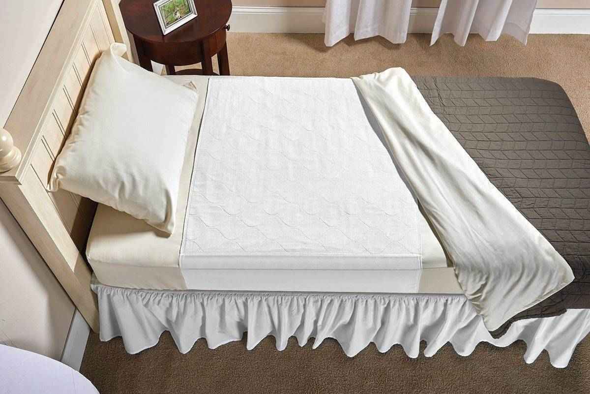 White quilted underpad with raised outer flap edges for full coverage