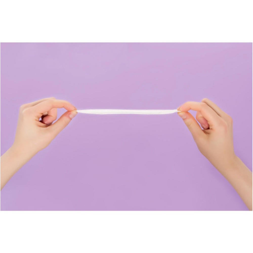 Light Regular lady liners held by hands, slim protective strip