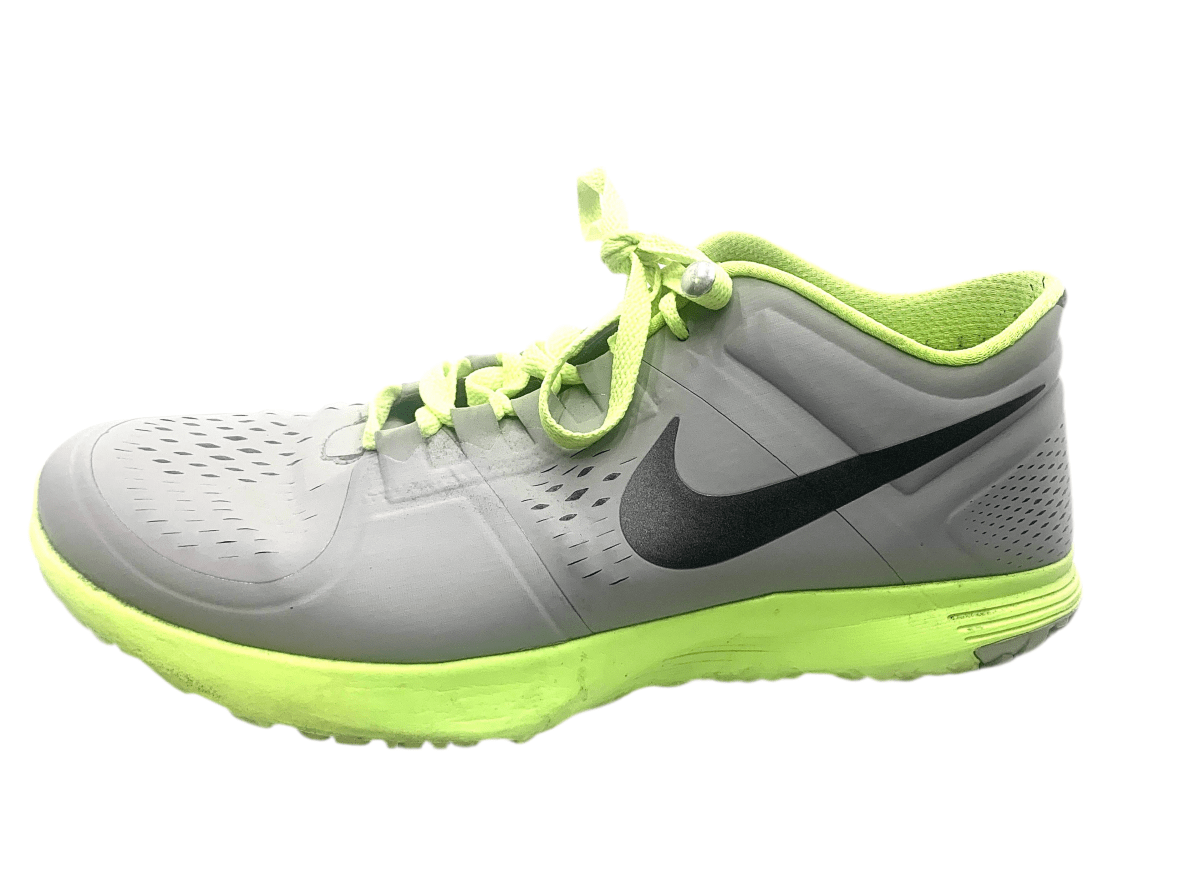 Lime-green lace-up athletic shoe with neon trim, dark swoosh, and perforated toe