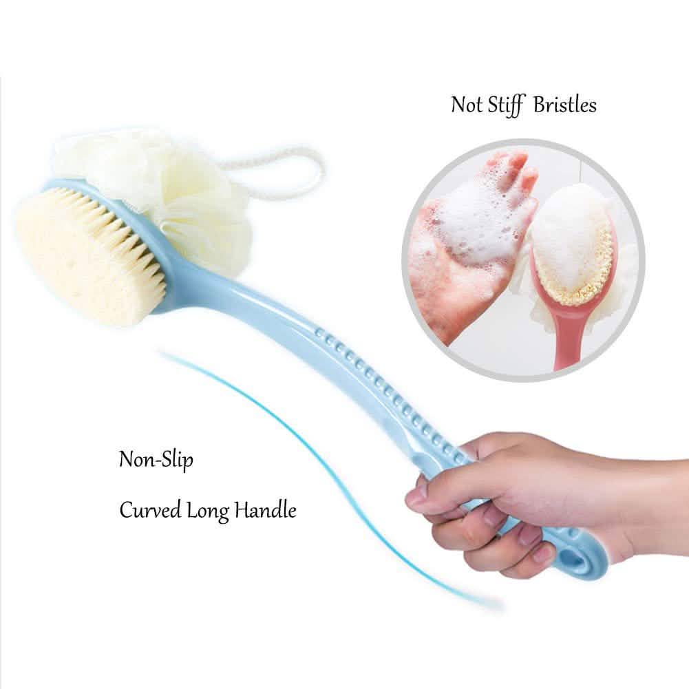 Bathing brush with non-stiff bristles and curved long handle, held by a hand.