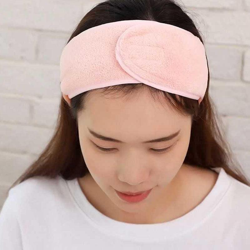 Pink terry cloth face-washing headband with wide cushioned band