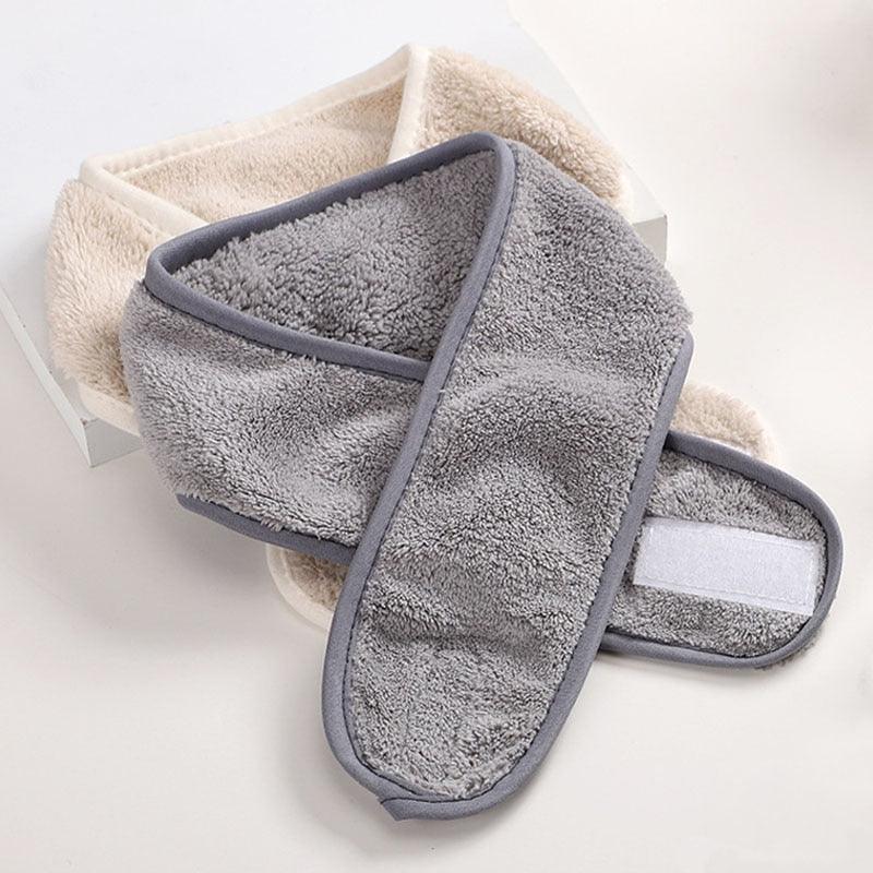 Gray terry toweling headband with dark gray edge, face washing accessory.