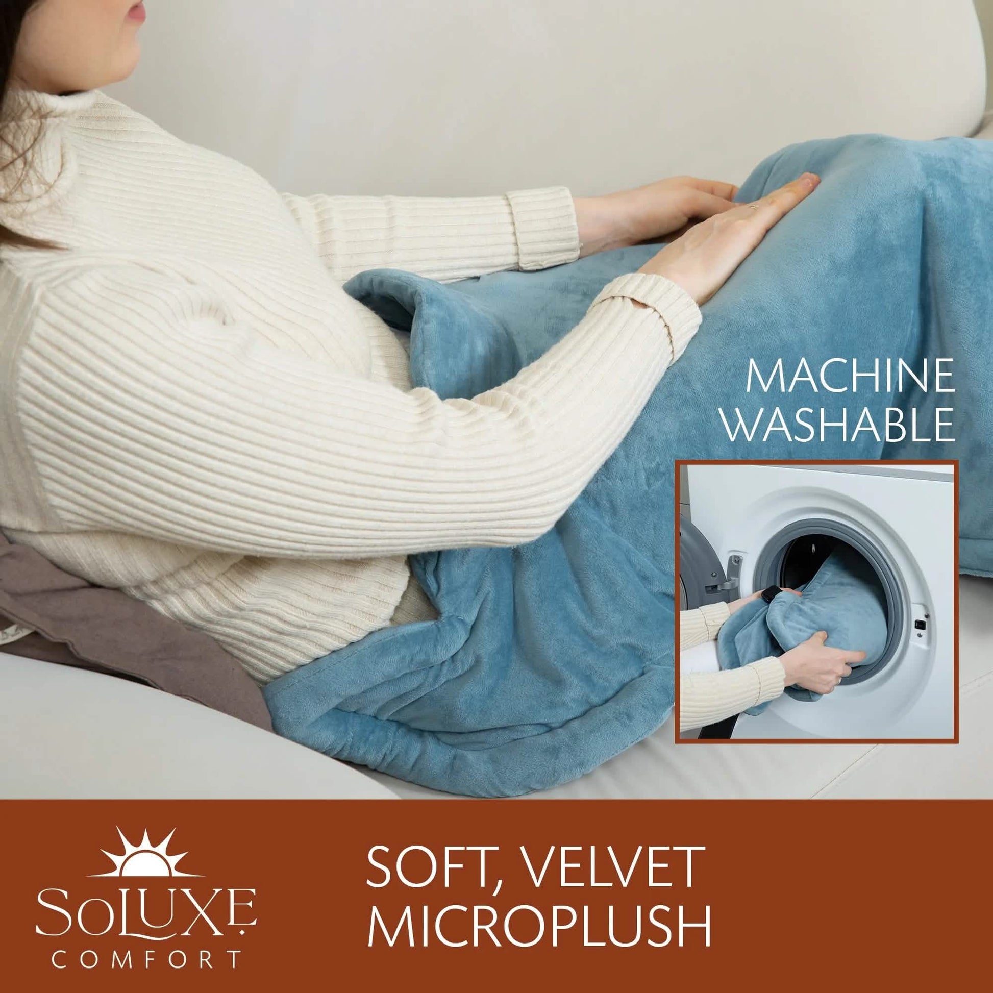 Blue plush heating pad for neck and back, positioned on lap with user hand