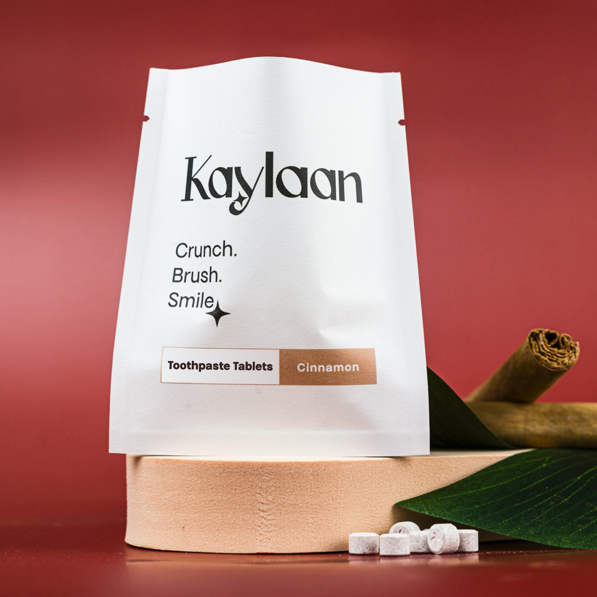 White toothpaste tablet pouch with Kaylaan brand and Cinnamon flavor label