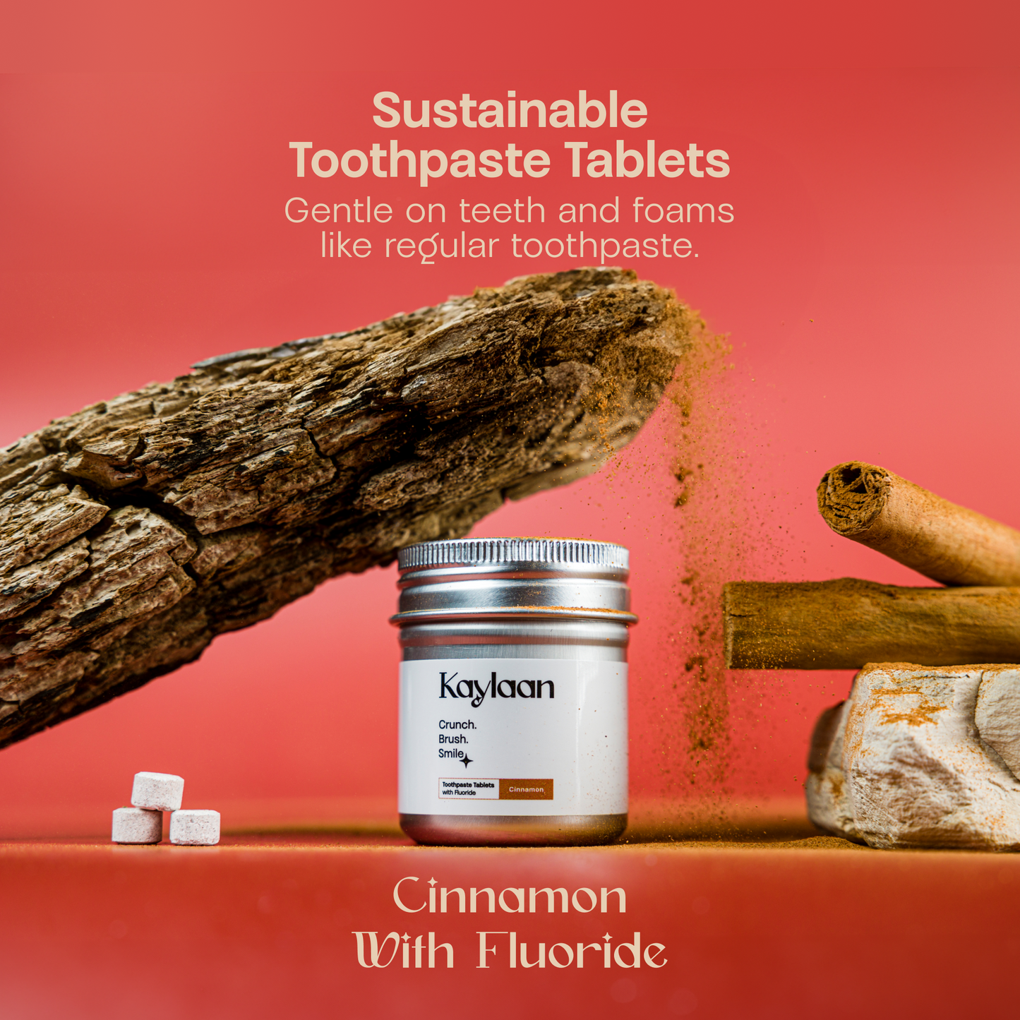 Fluoride cinnamon toothpaste tablets jar with Kaylan label and scattered tablet blocks