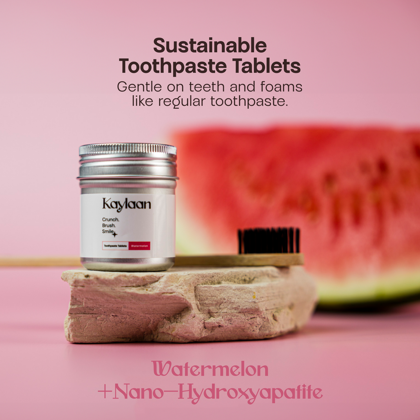 Kaylaan watermelon toothpaste tablets metal jar on a recycled block