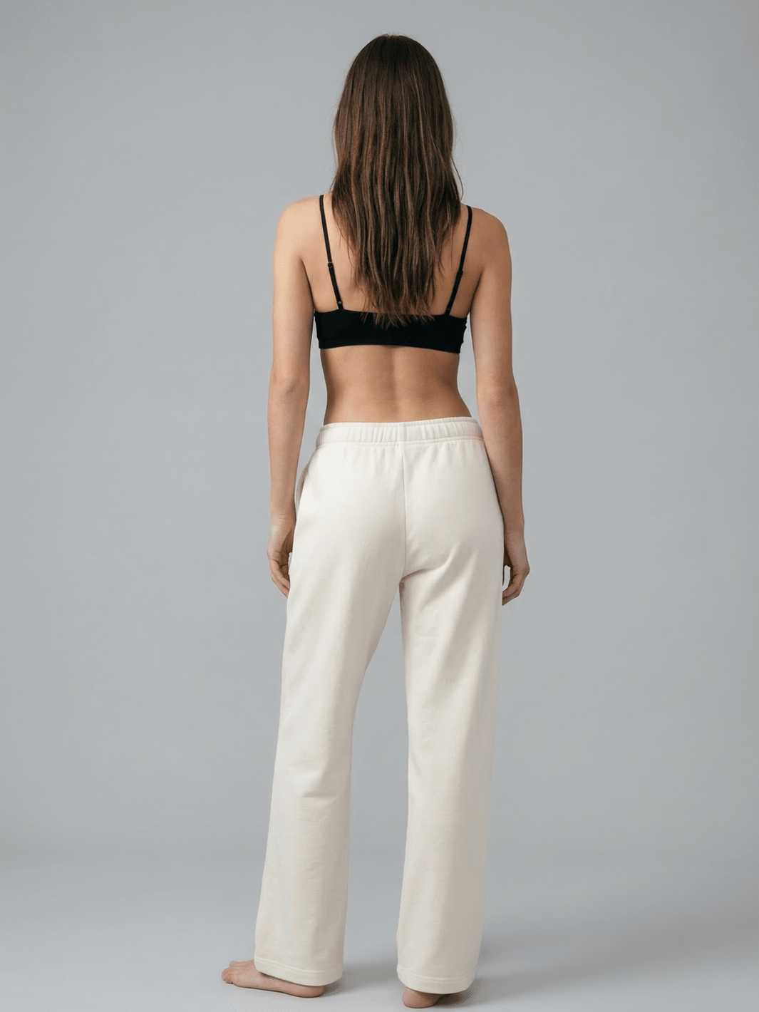 White straight-leg sweatpants with elastic waistband and full back coverage