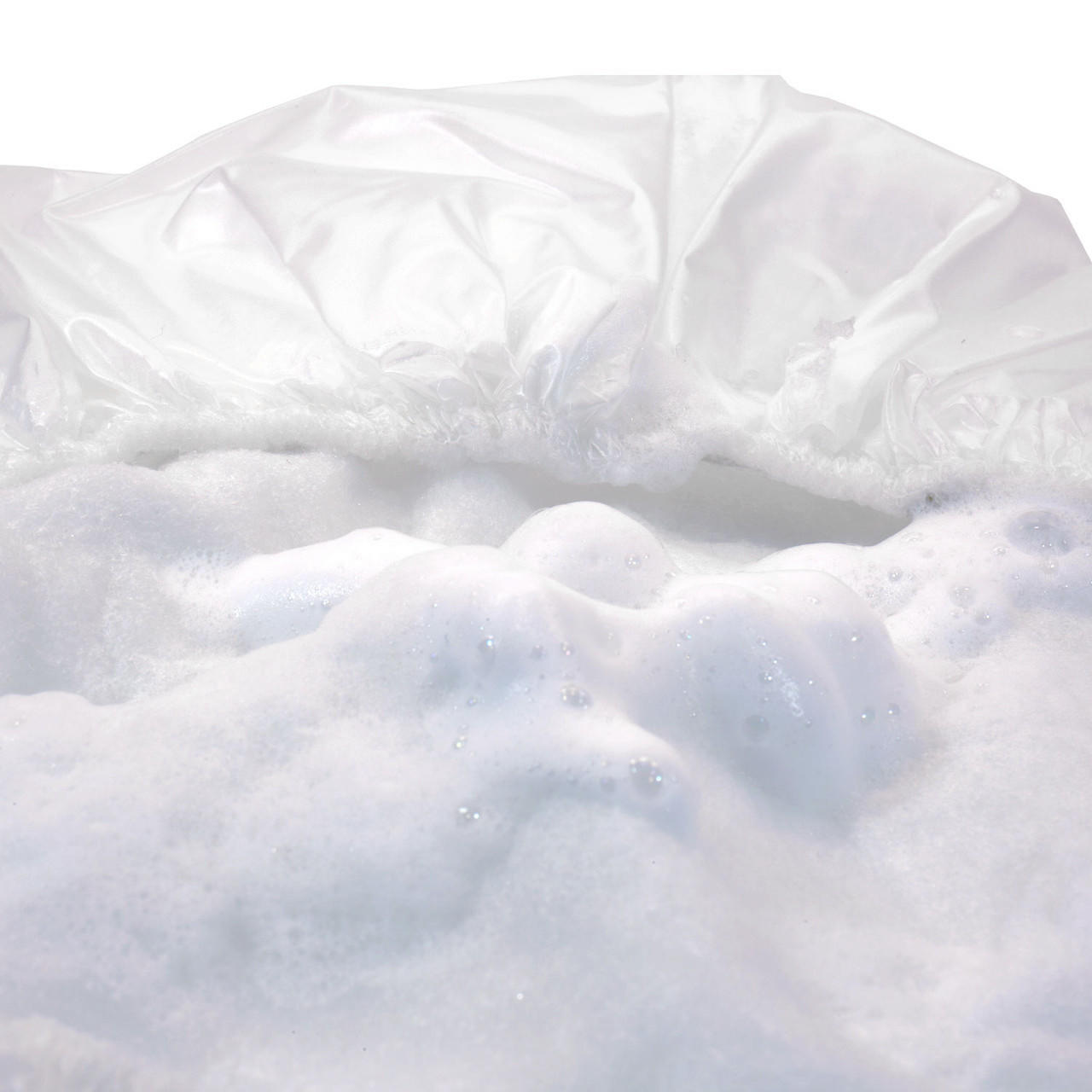 Close-up of white shampoo cap liner with pre-moistened gel