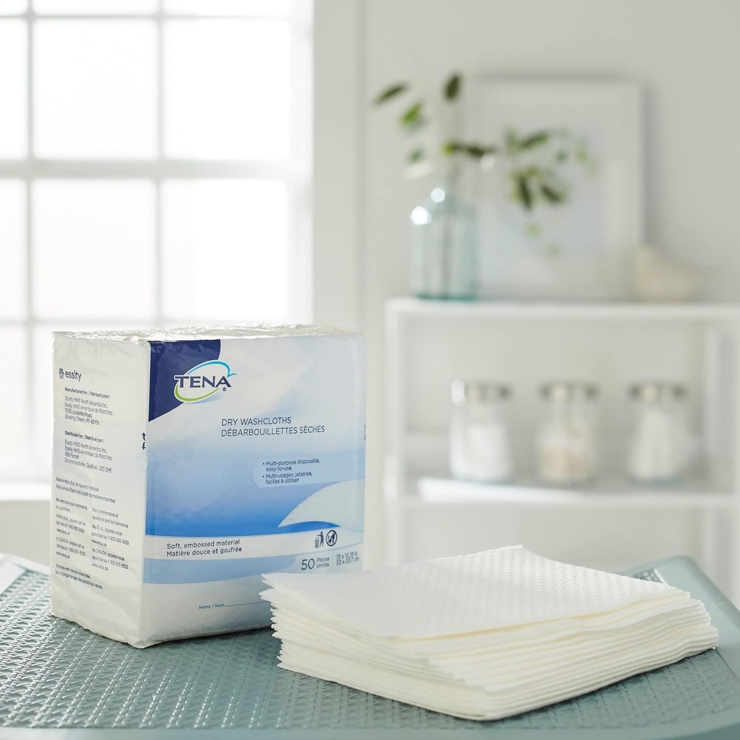 Boxed pack of 50 dry washcloths with folded white cloths