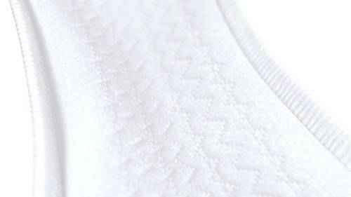Heavy Long ProSkin pad surface close-up, white textured absorbent layer