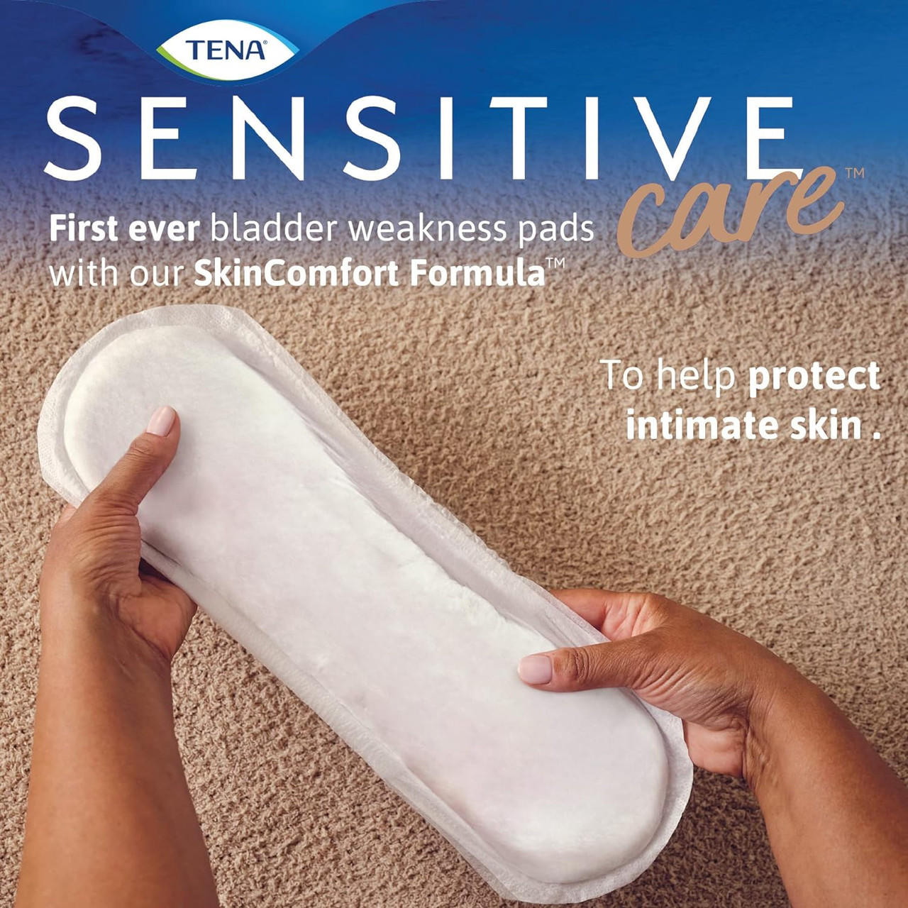 Sensitive Care absorbent pad held in hands, white liner, long regular fit