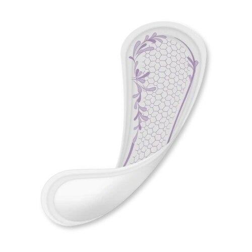 Very light incontinence liner with soft curved shape and purple absorbent core