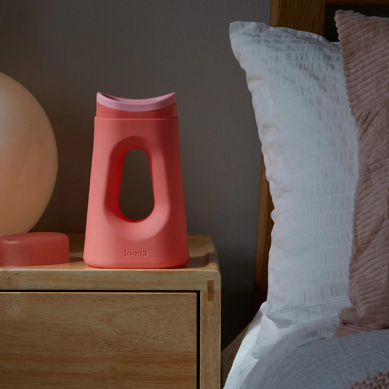 Coral Dream female urinal with closure, upright molded plastic with oval opening