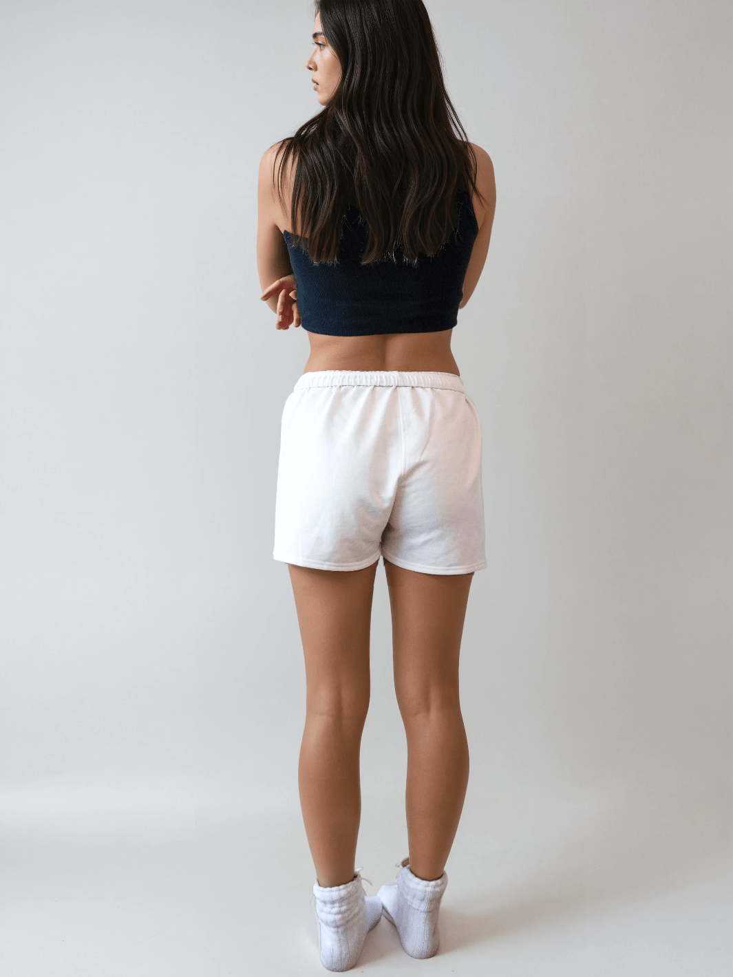 White lounge sweatshorts from back with elastic waistband