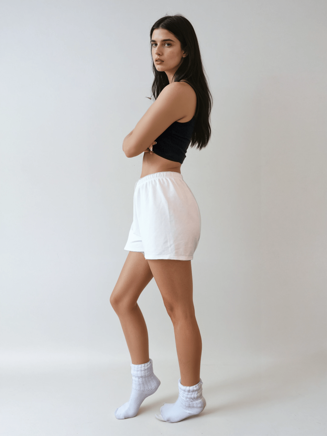 White lounge sweatshorts with elastic waistband and relaxed fit