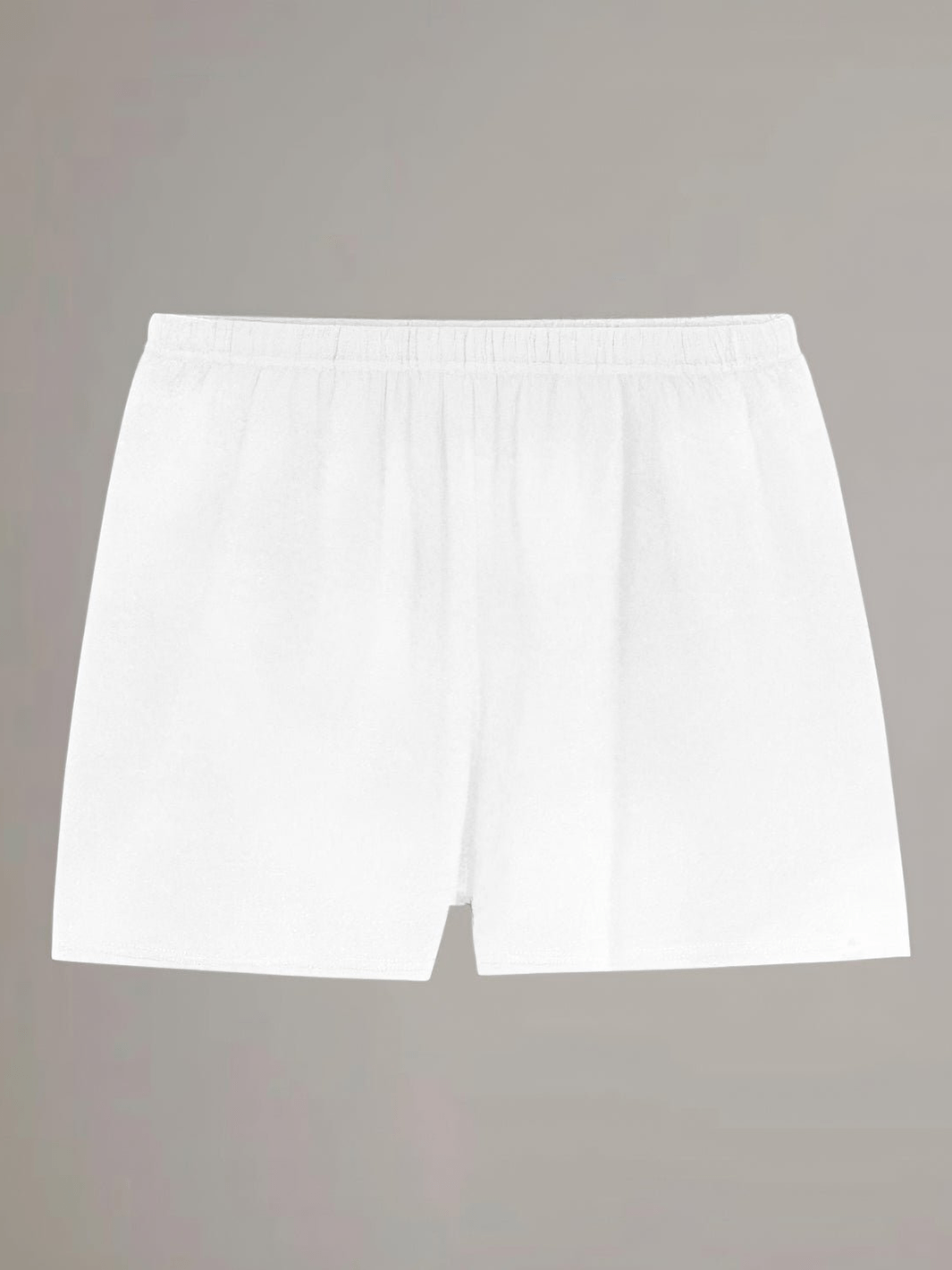 White sweatshorts with elastic waistband and relaxed straight legs