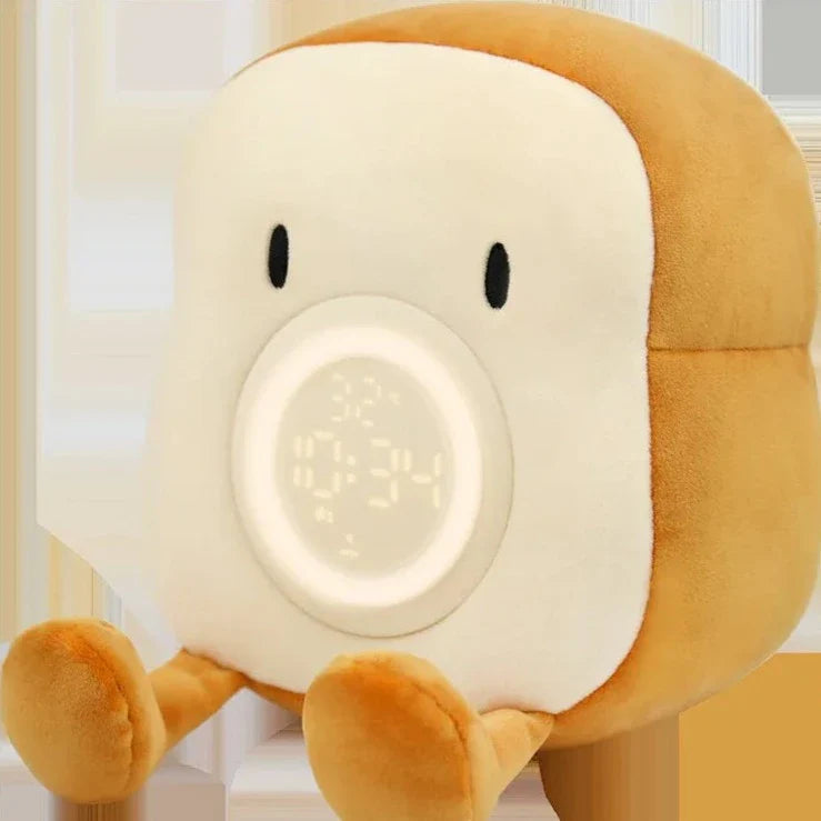 Toast plush alarm clock night light close-up with lit circular screen