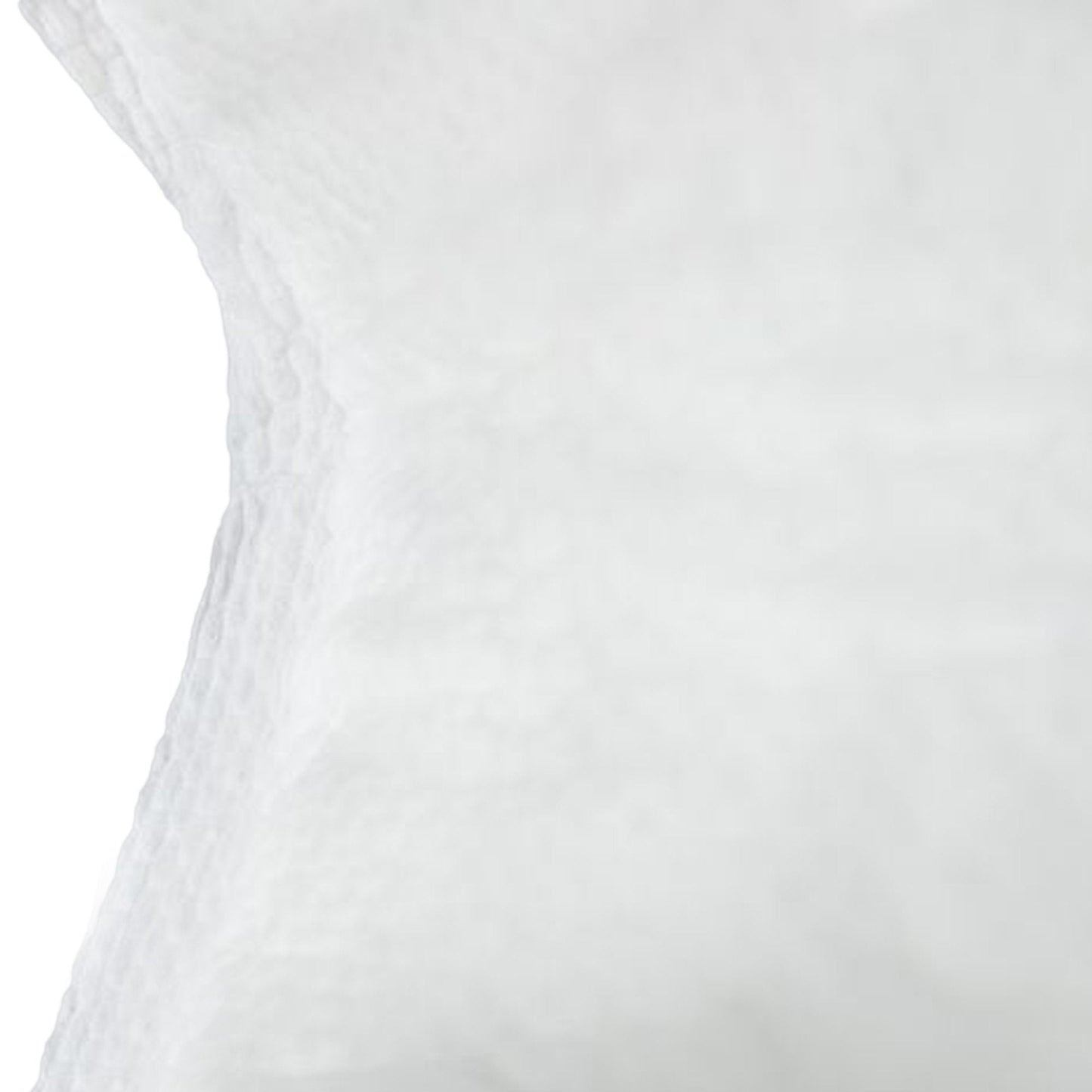 Close-up of white disposable booster pad absorbent surface
