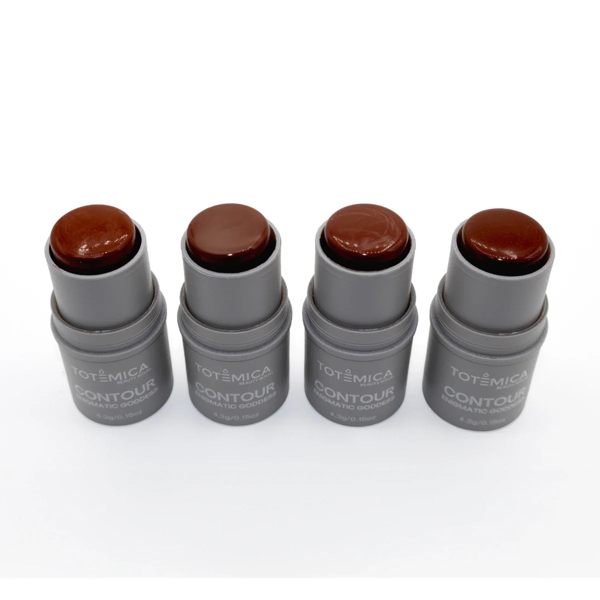 Totemica contour sticks lineup with maroon, brown, and dark espresso caps