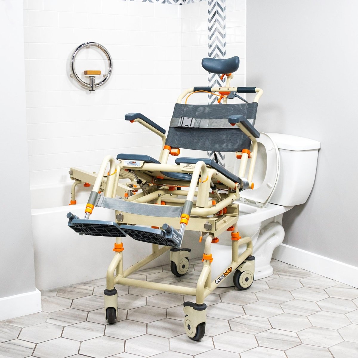 Over-bath shower chair in bathroom setting with dark blue backrest, seat pad, and armrests