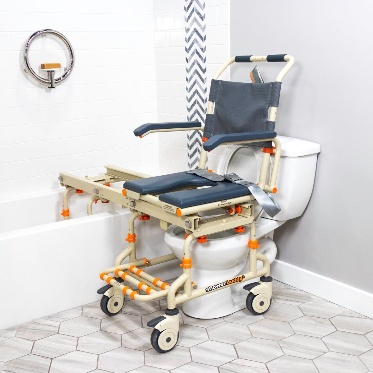 Shower chair for over-bath use with dark blue seat, safety straps and side handles