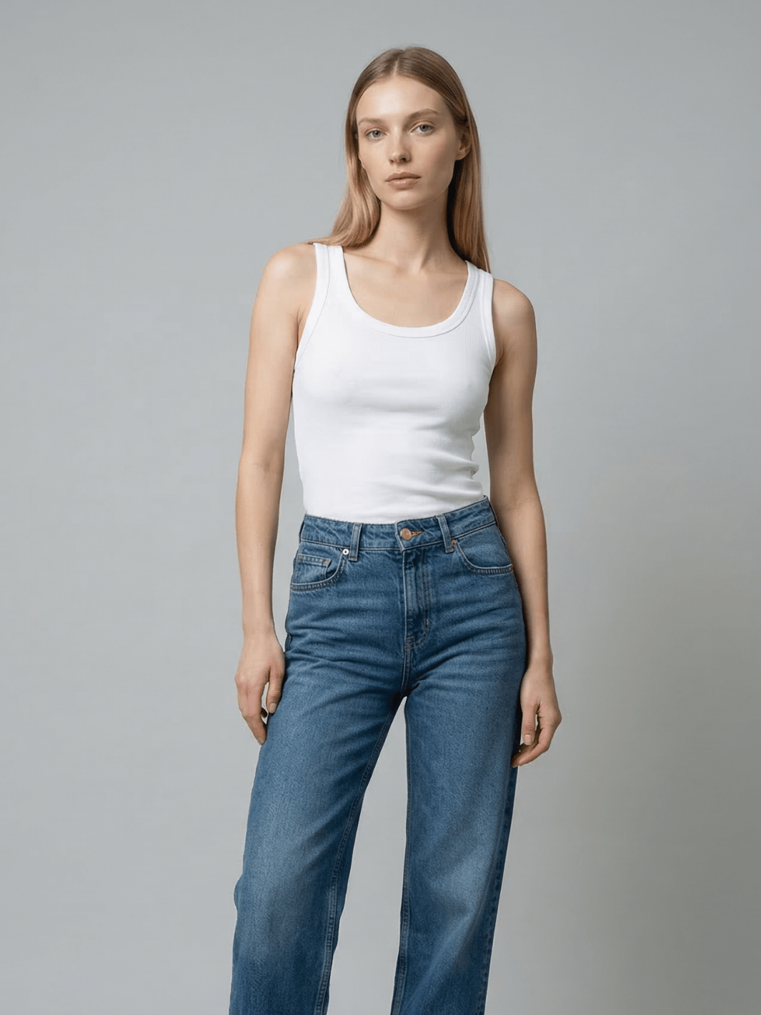White ribbed tank top with scoop neck and fitted sleeveless bodice