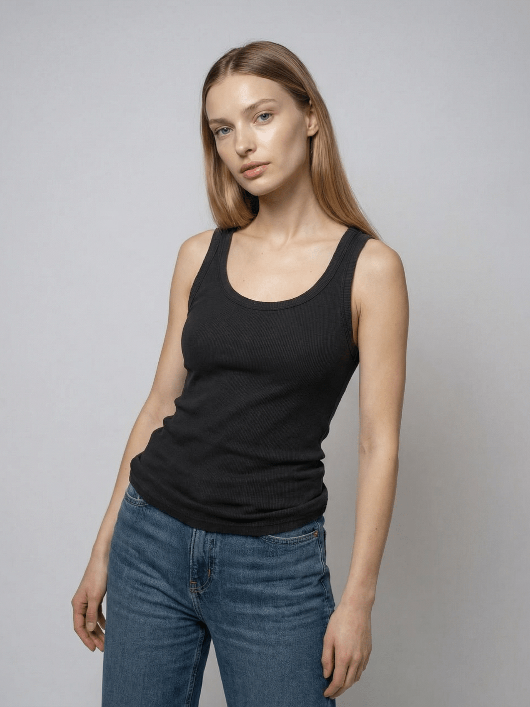 Black ribbed tank top with scoop neck and fitted ribbed knit