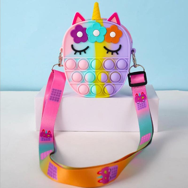 Rainbow-colored unicorn fidget pop crossbody bag with flower hair and rainbow strap