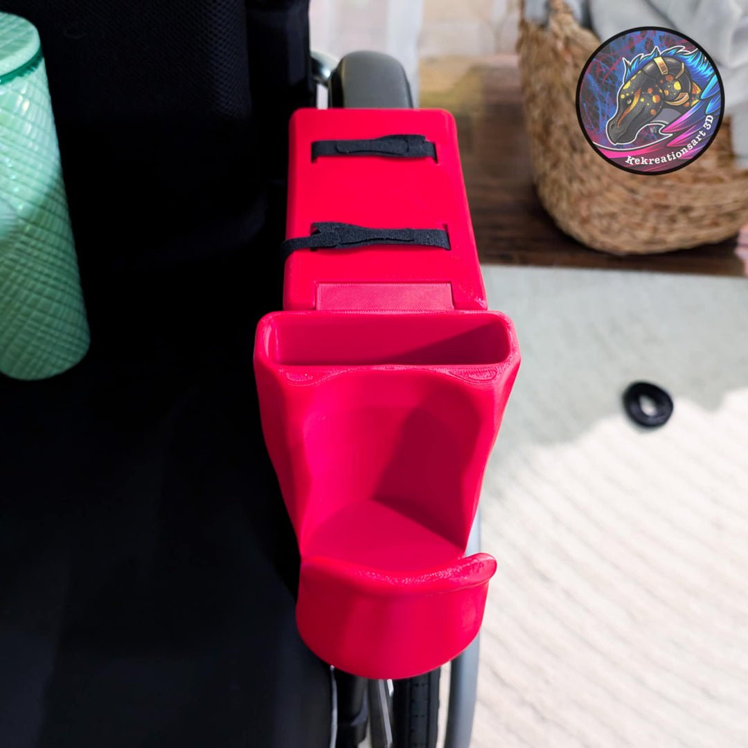 Red 3D printed wheelchair cup & phone holder attached to armrest