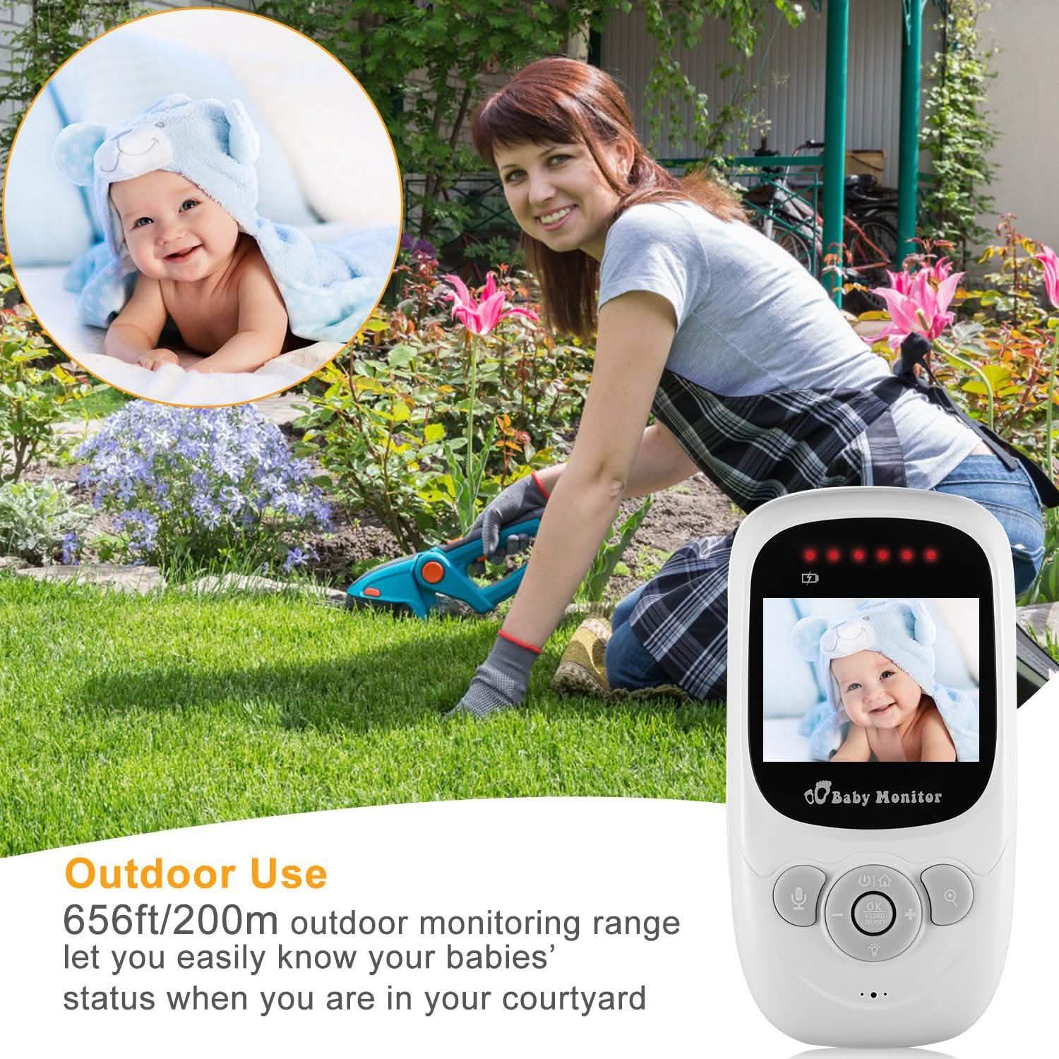 White baby monitor handheld unit with screen showing a baby photo