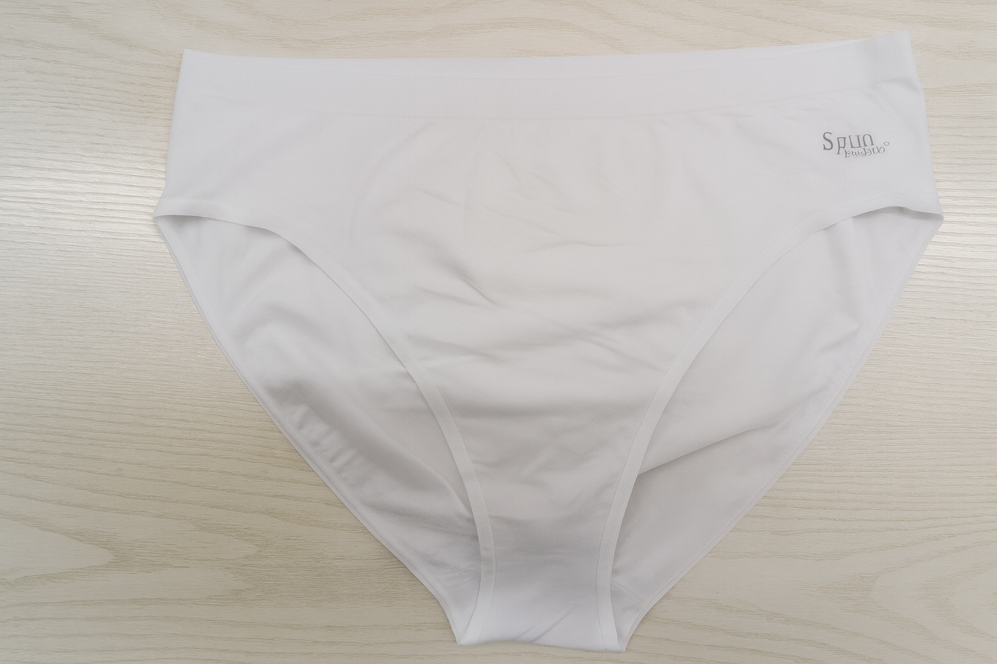 Women's high-leg brief, white, smooth stretch fabric and logo waistband