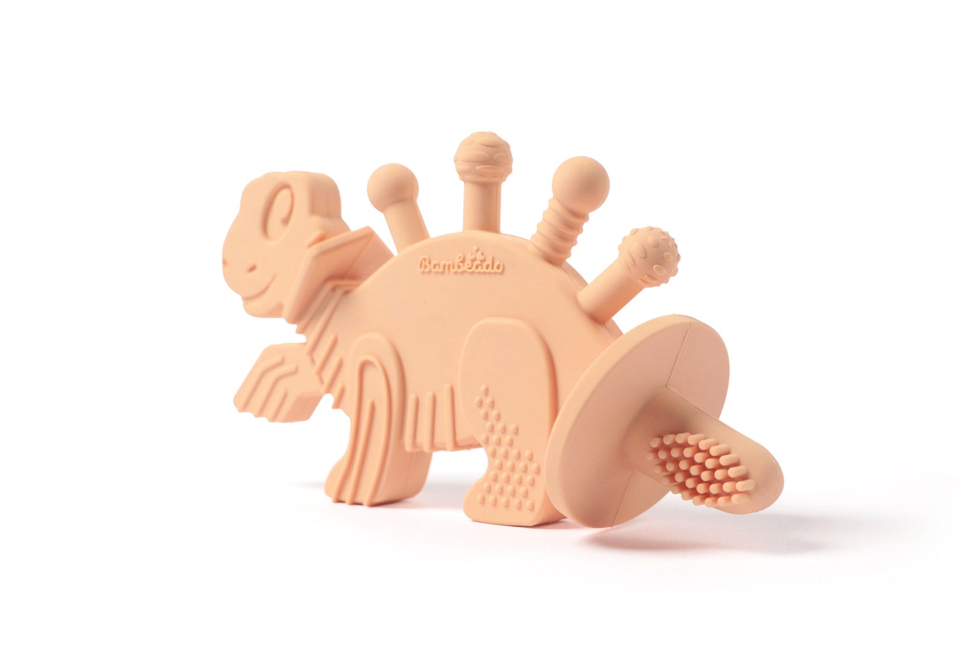 Squishy toy shaped like a dinosaur on a white background