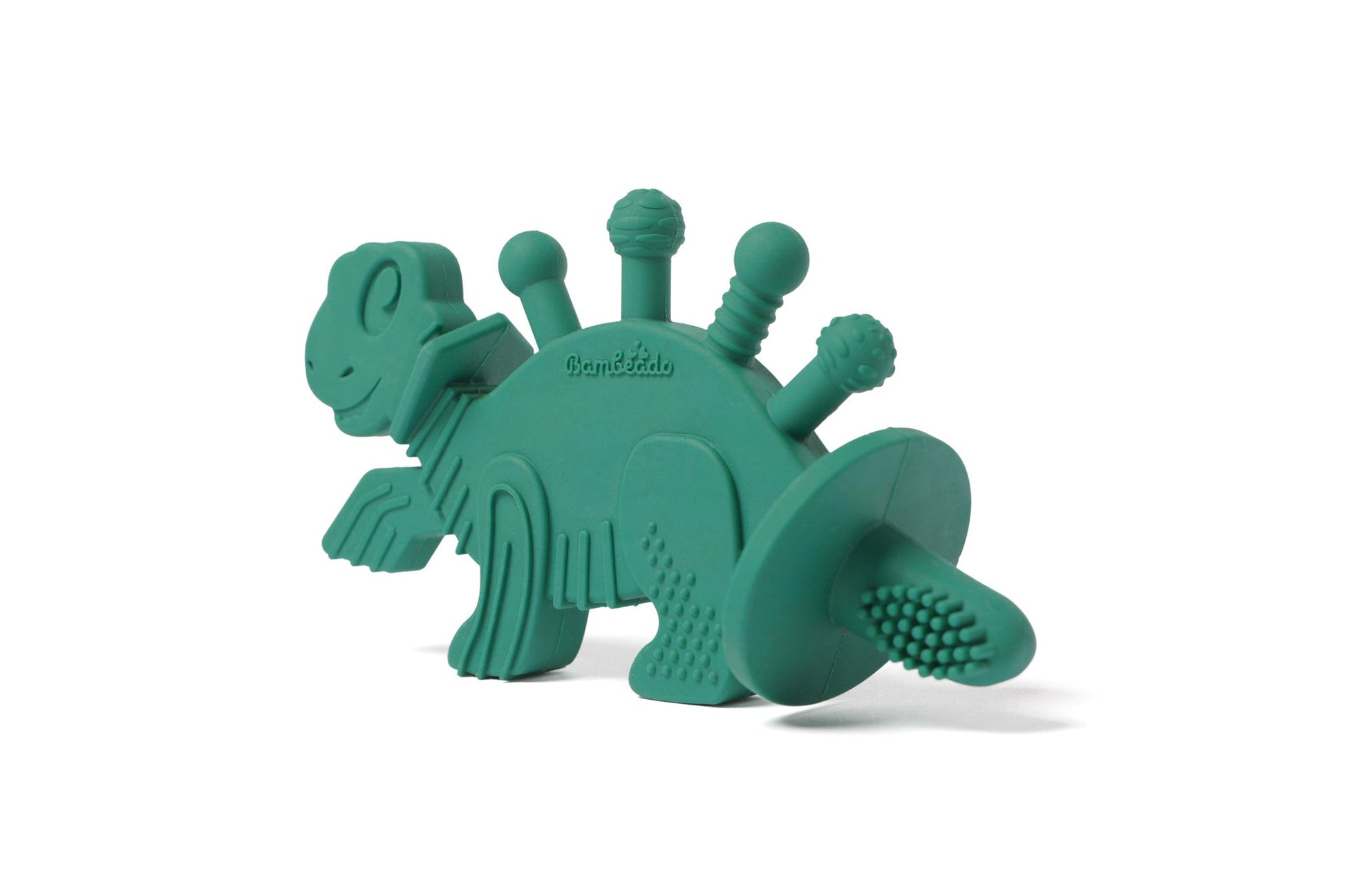 Green dinosaur-shaped teething toy on a white background