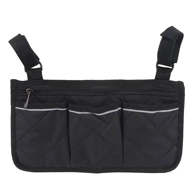Wheelchair armrest organizer bag in black with three front pocket sections and top zipper