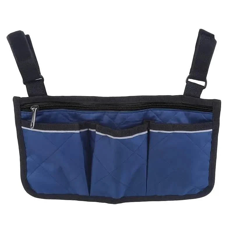 Wheelchair armrest organizer bag in blue with three front pockets and zip-top opening