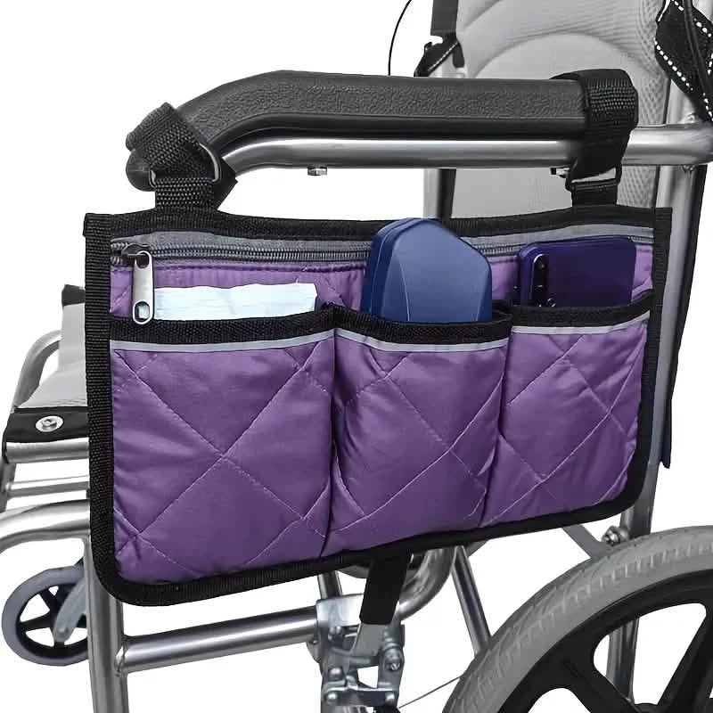 Wheelchair armrest organizer bag in purple with front pockets and zip-top opening