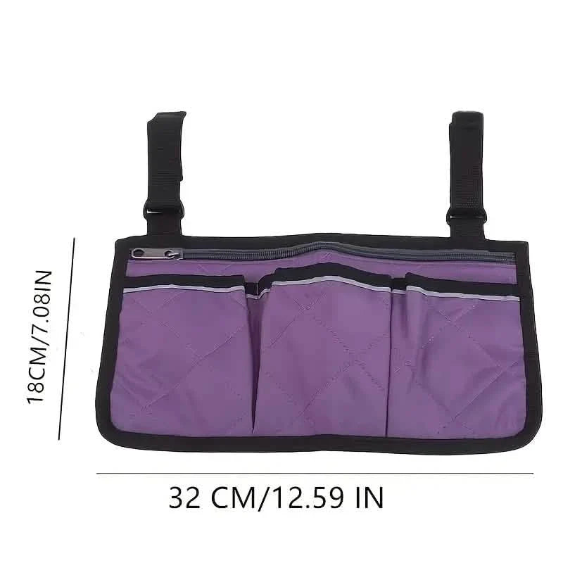 Wheelchair armrest organizer bag in purple with three front pockets and black attachment straps