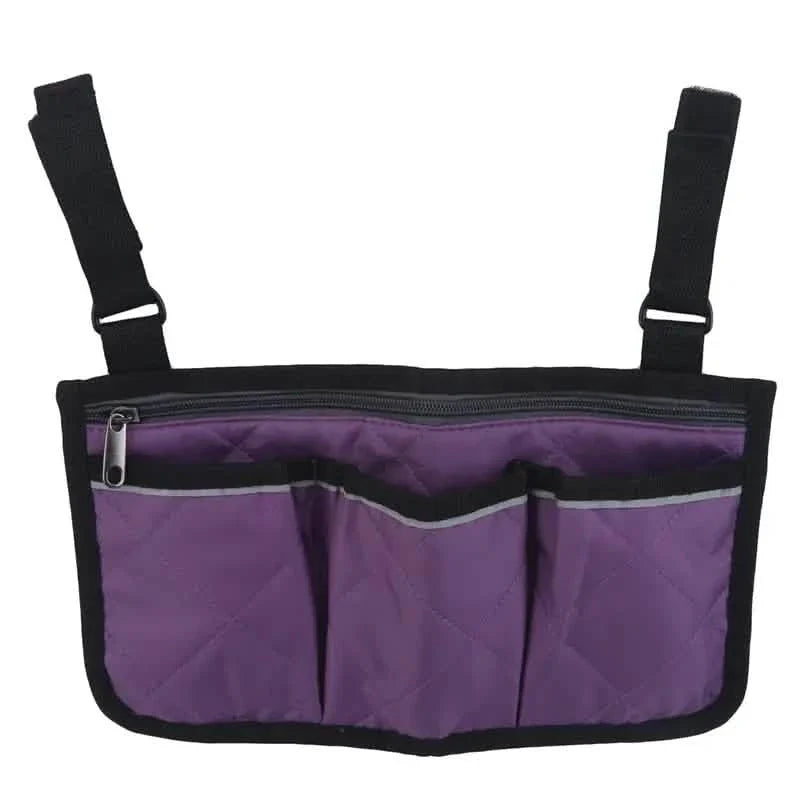 Wheelchair armrest organizer bag in purple with three front pockets and black trim