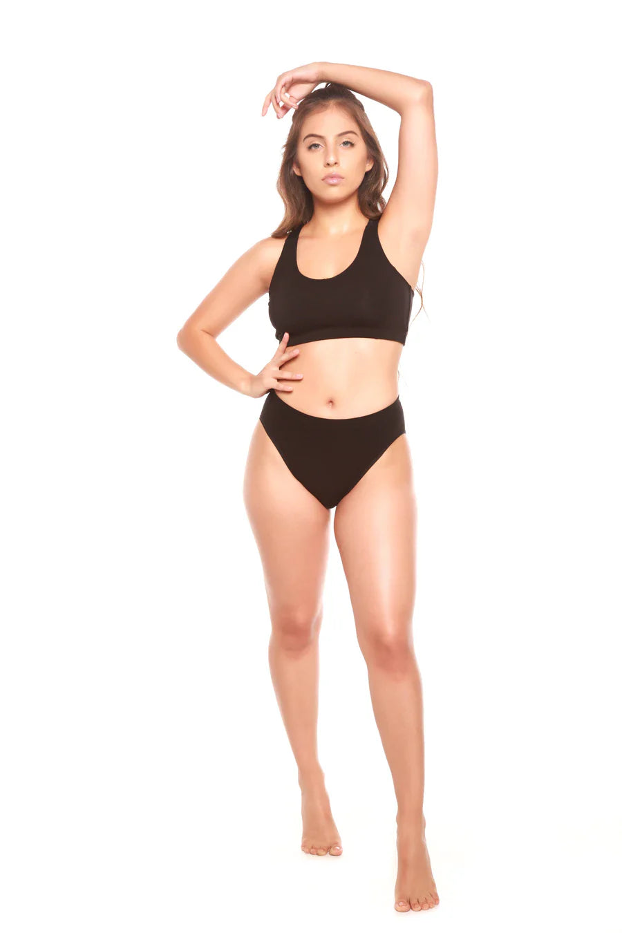 Black high-leg brief underwear worn on the hips with smooth coverage