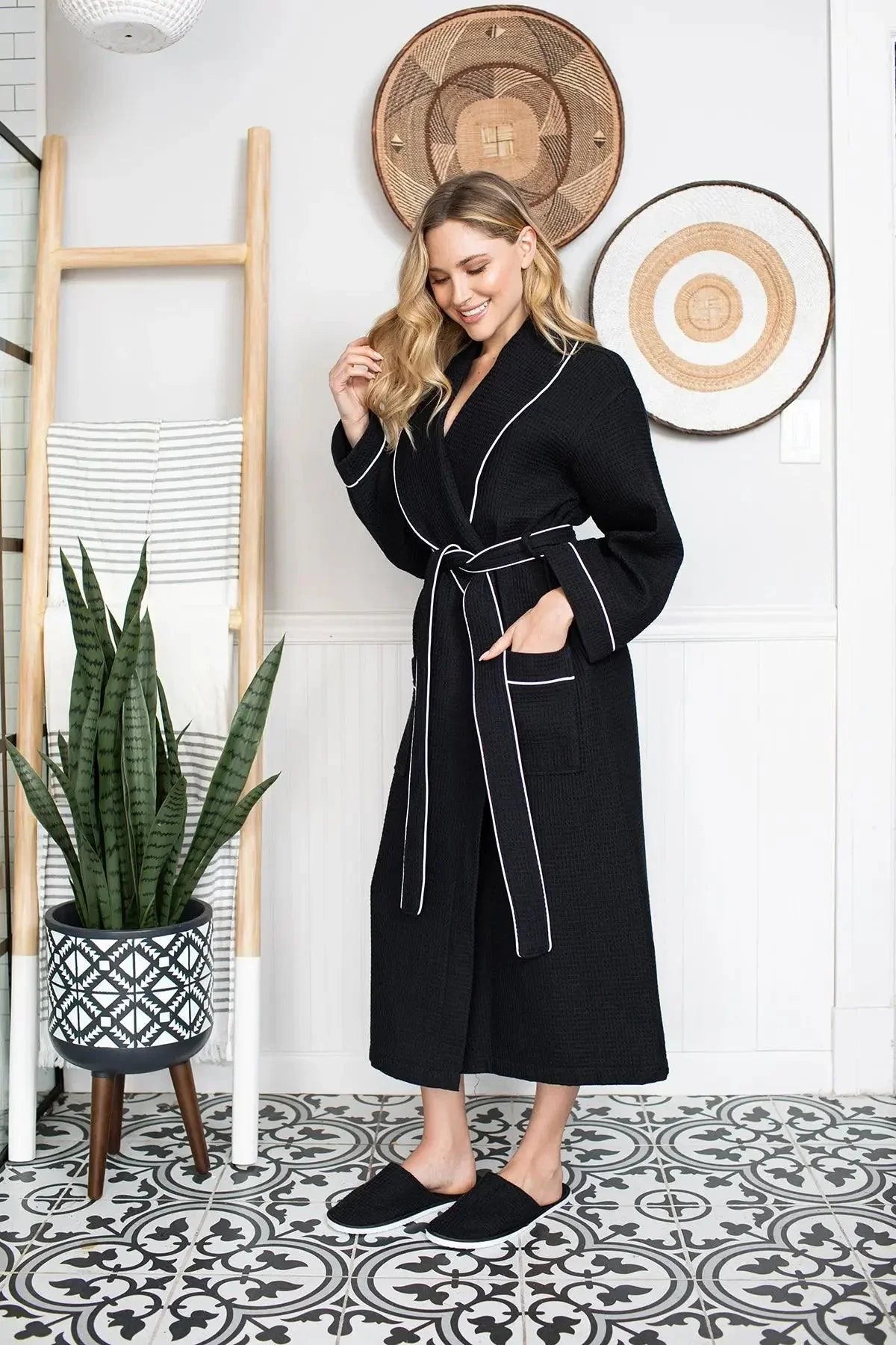 Women's waffle bathrobe in dark with contrast piping and waist tie belt, long sleeves